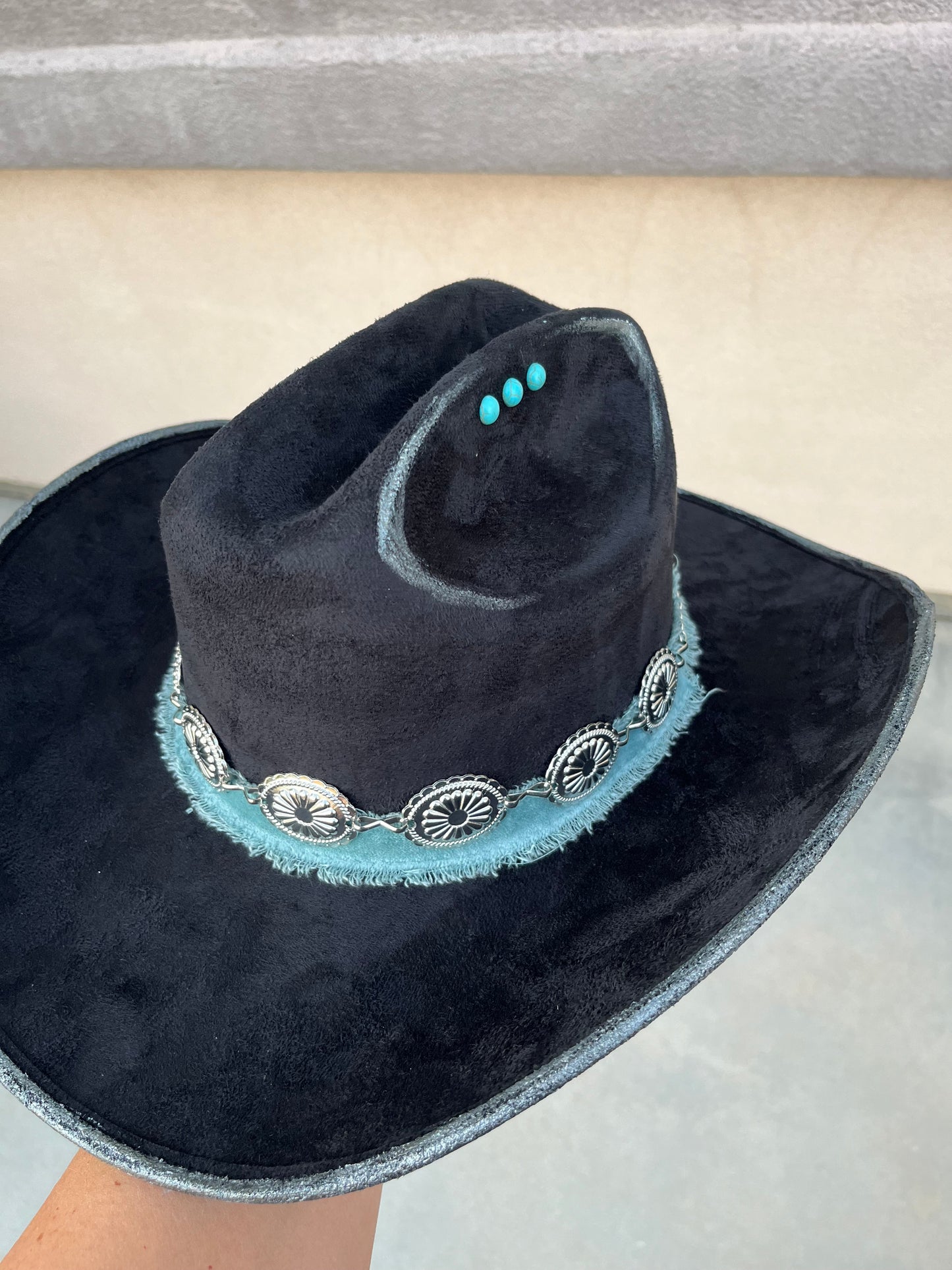 Black fabric lined turquoise burned suede wide brim cowboy hat