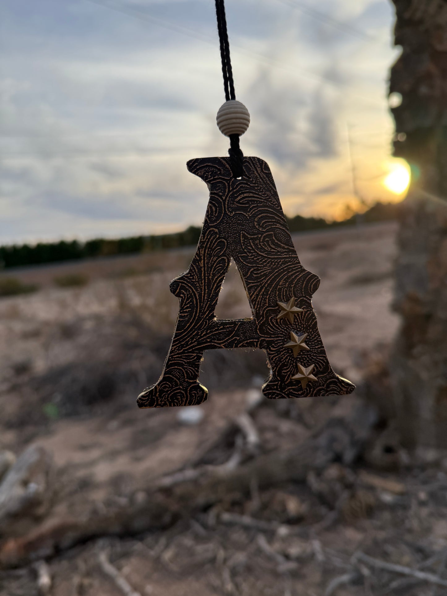 Tooled leather initial rearview mirror charm
