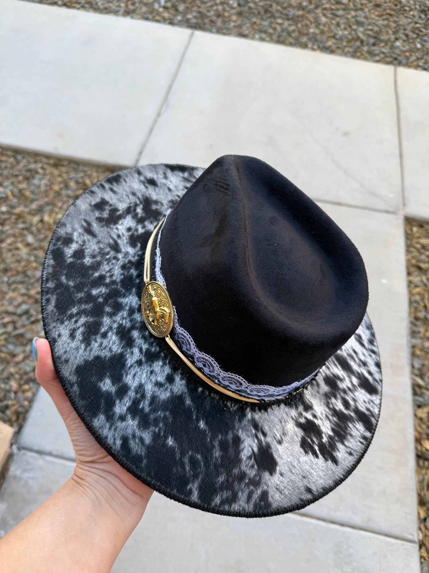 Black cowhide burned fabric lined felt wide brim rancher hat