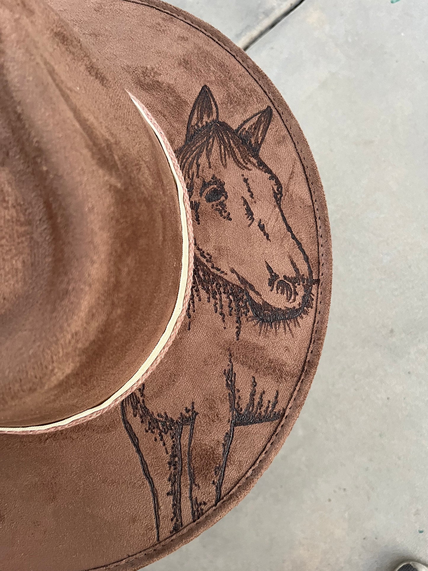 Brown distressed horses burned accessorized fabric lined suede wide brim rancher hat