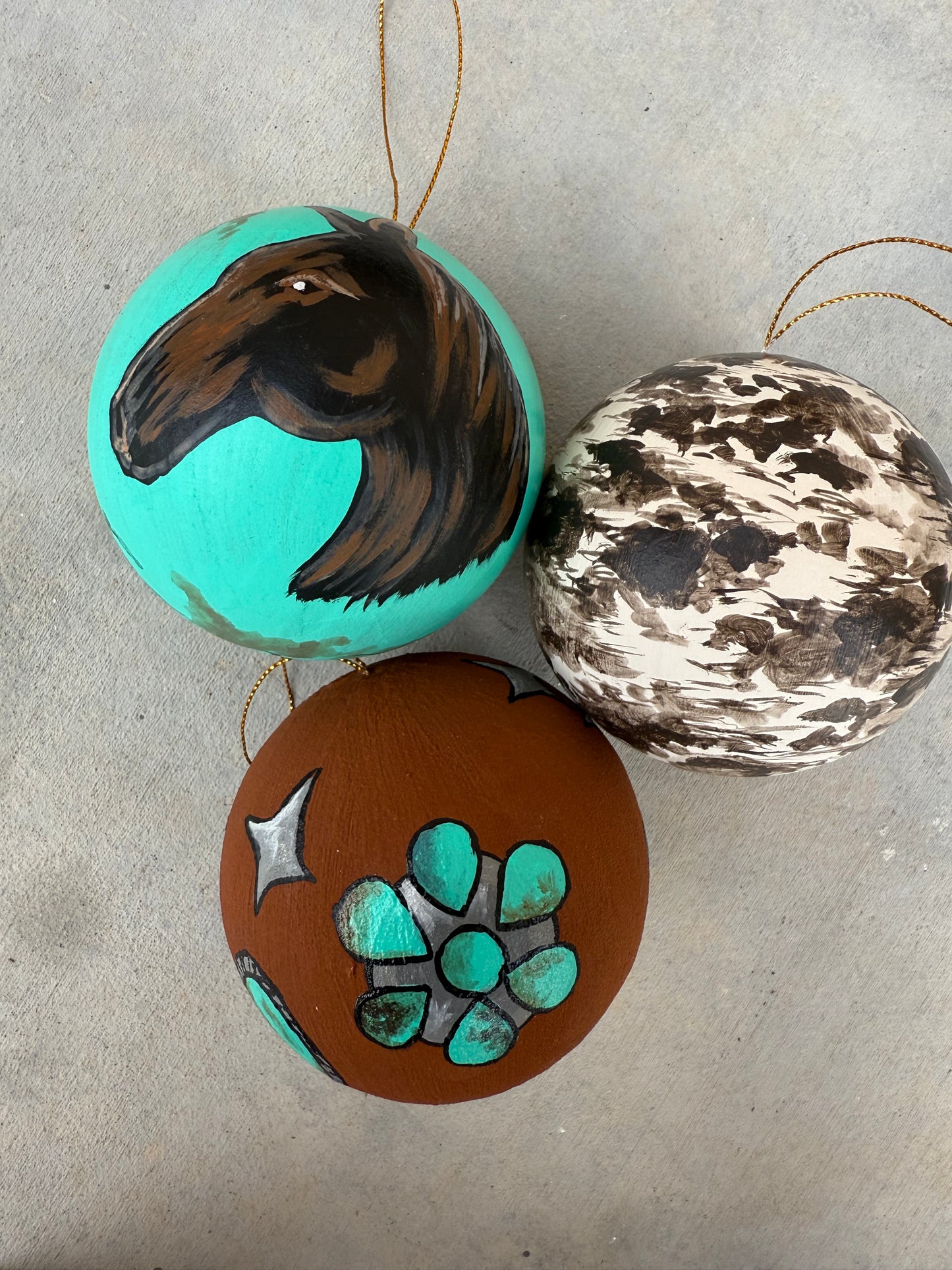 Set of three western Christmas ornaments