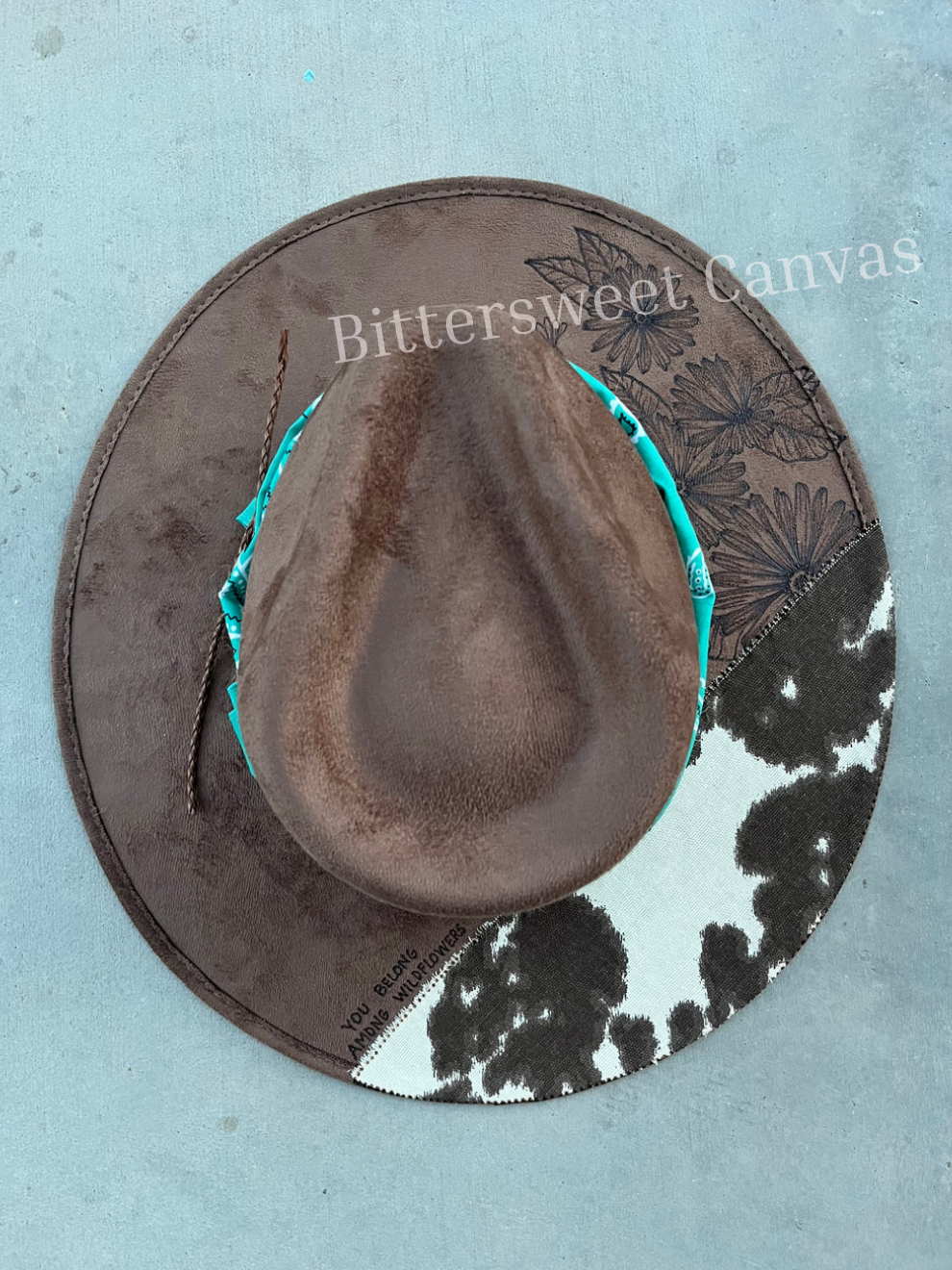 Mocha brown floral cowhide burned fabric lined felt wide brim rancher hat