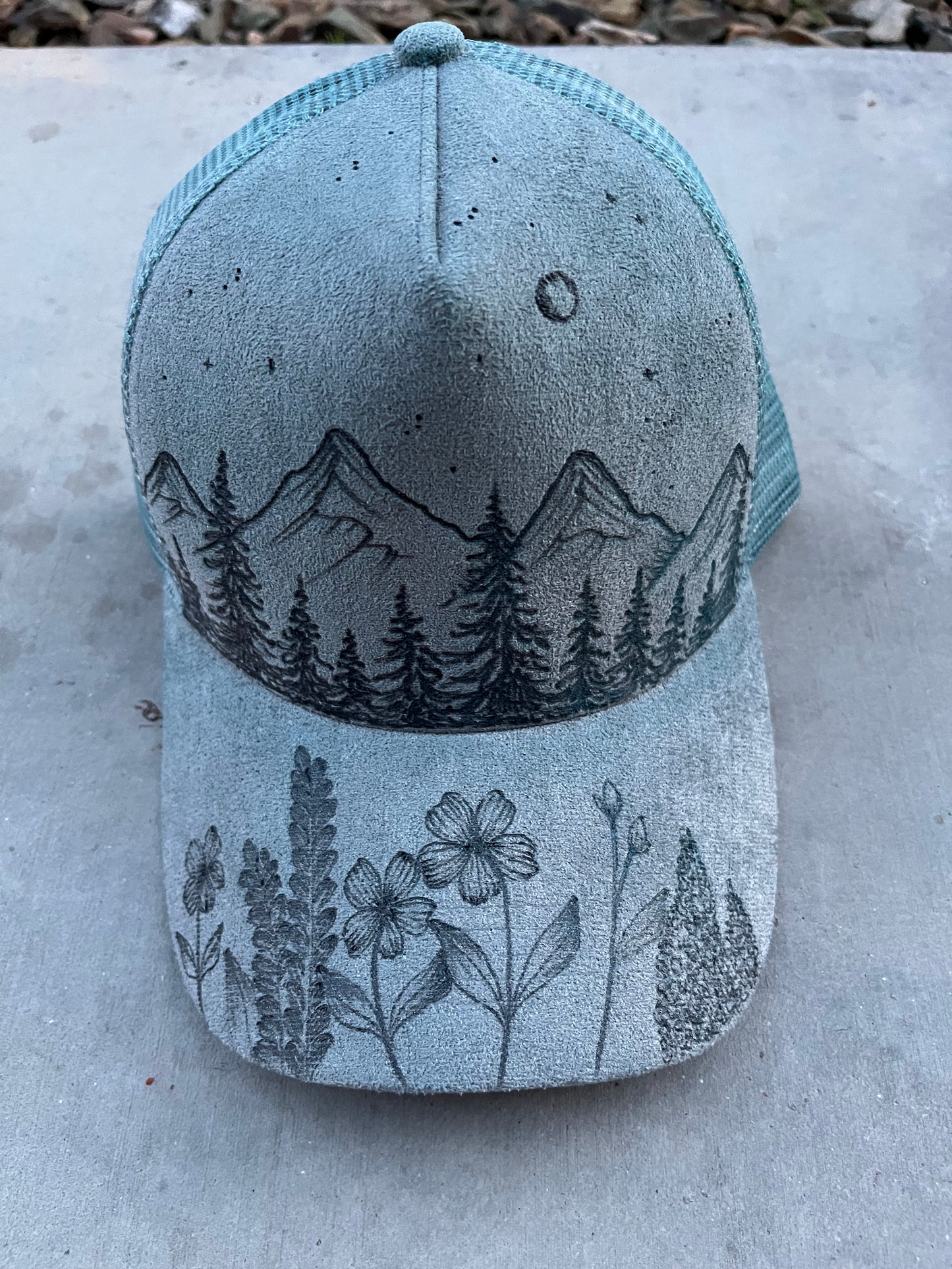 Burned blue mountain ball cap