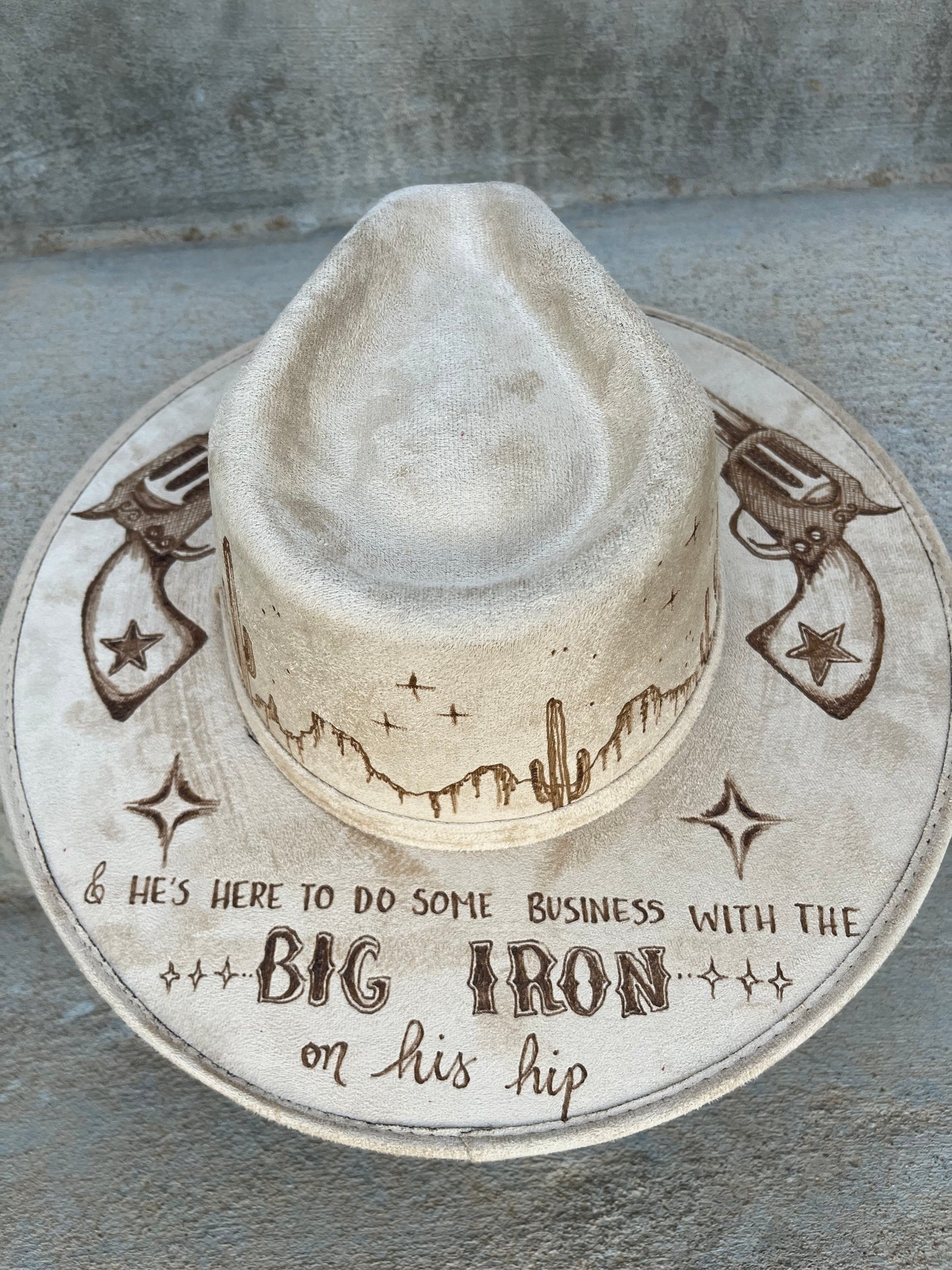 Big iron revolvers western beige burned suede wide brim rancher hat