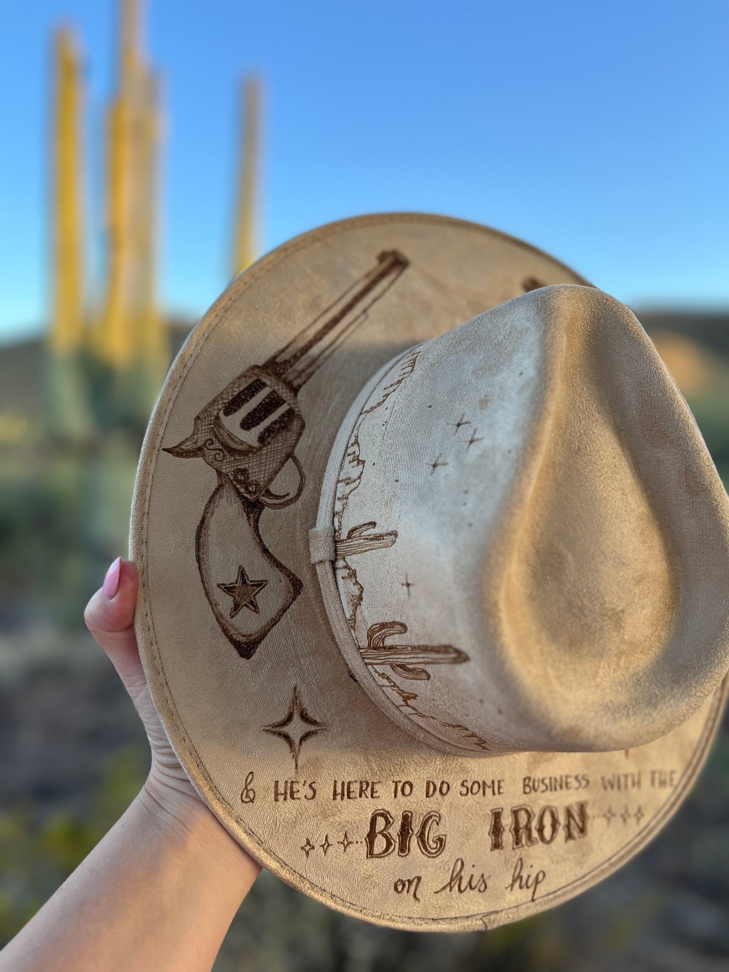 Big iron revolvers western tan burned suede wide brim rancher hat