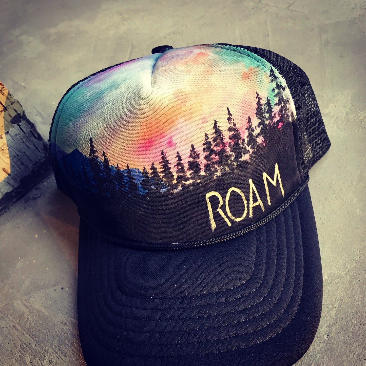 Roam pastel custom painted trucker hat.