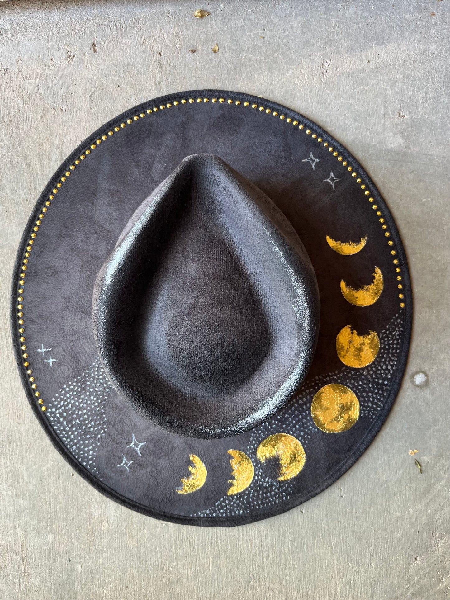 Dark grey moon phases gold burned suede wide brim rancher hat