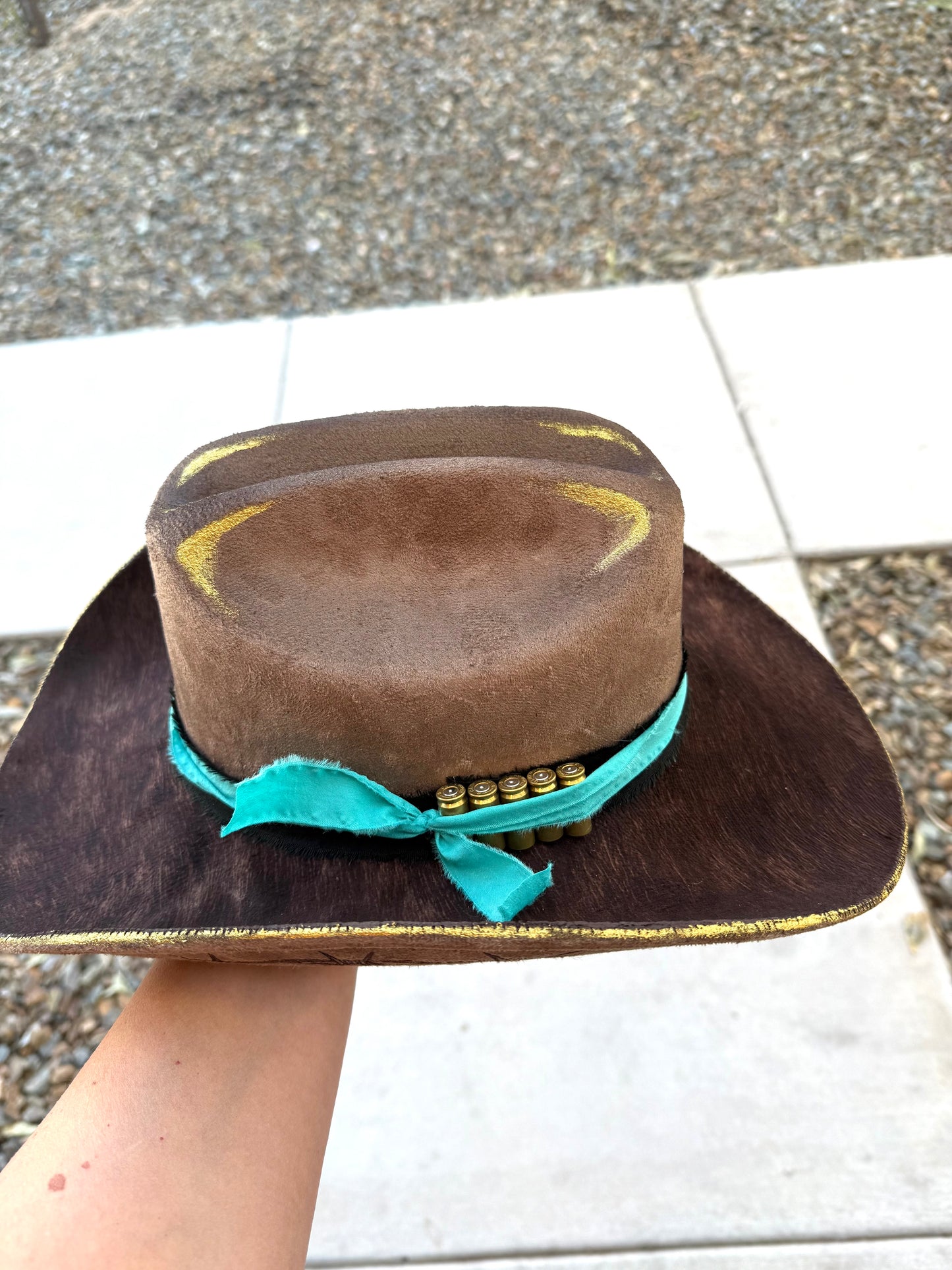 Brown gold cowhide burned fabric lined felt wide brim rancher hat