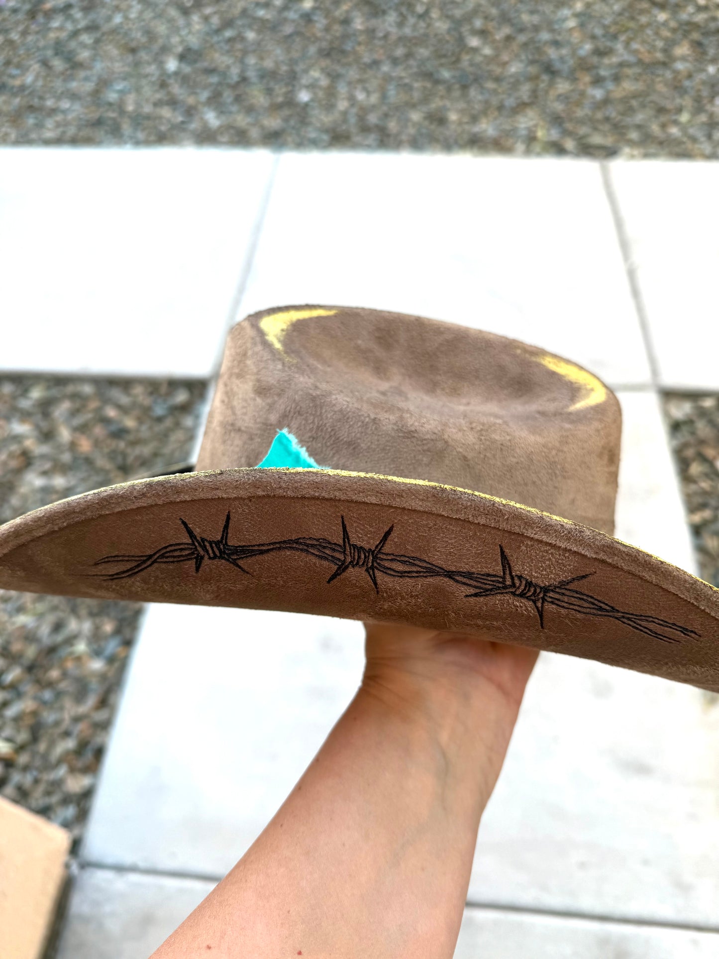 Brown gold cowhide burned fabric lined felt wide brim rancher hat