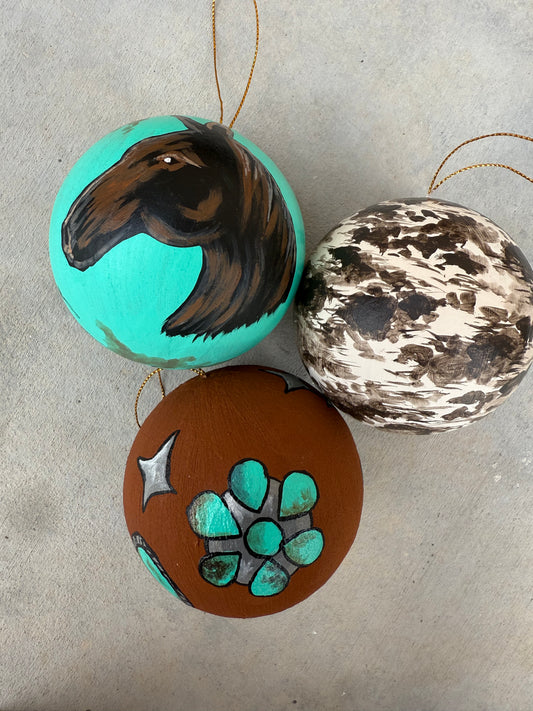 Set of three western Christmas ornaments