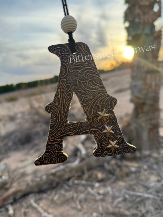 Tooled leather initial rearview mirror charm