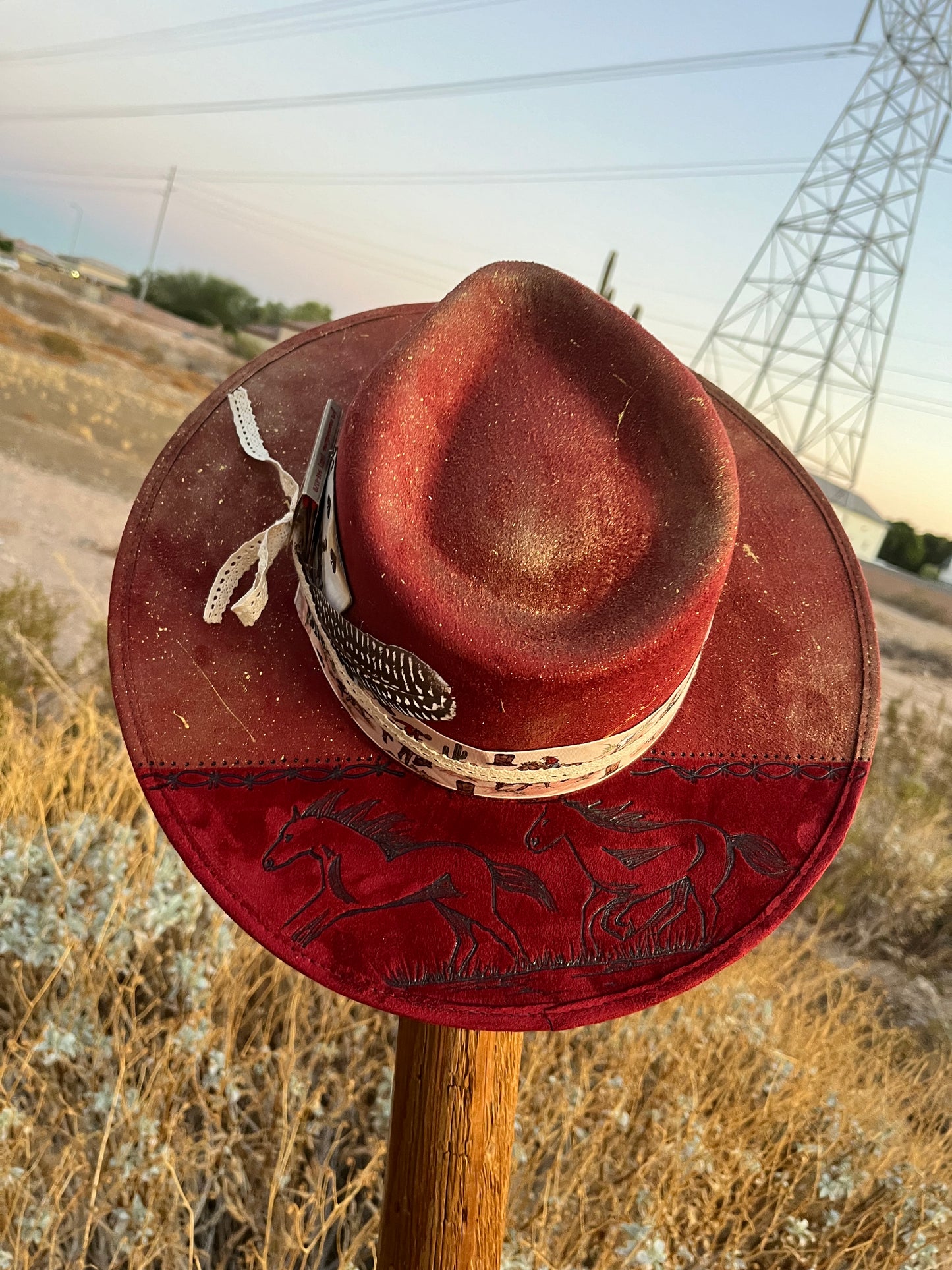 Distressed maroon burgandy horses burned accessorized suede wide brim rancher hat