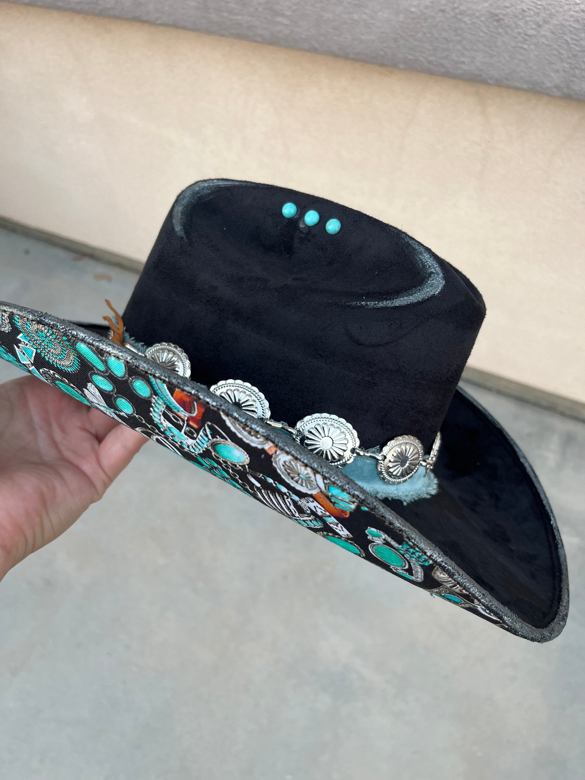 Black fabric lined turquoise burned suede wide brim cowboy hat