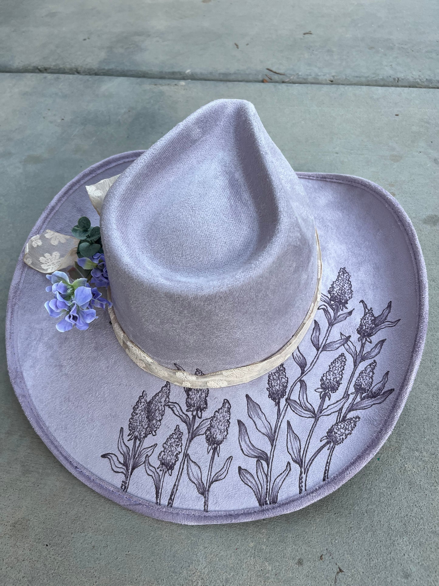 Lavender cowboy burned accessorized suede wide brim rancher hat