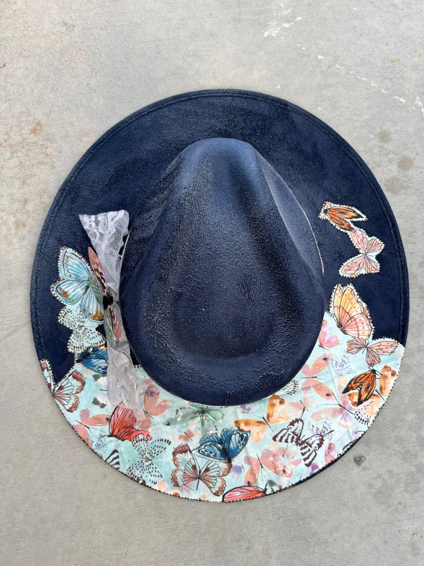 Navy butterfly burned fabric lined felt wide brim rancher hat