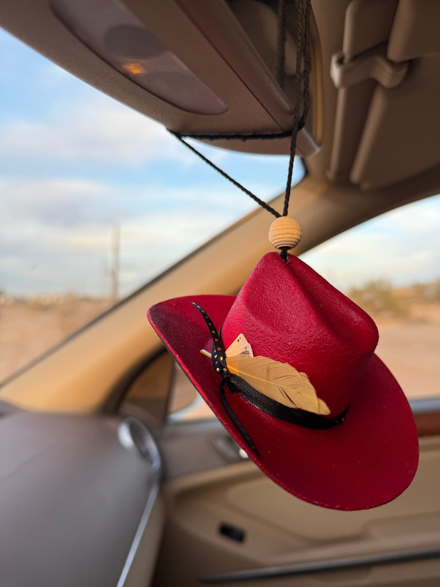 Red accessorized hat rearview mirror charm