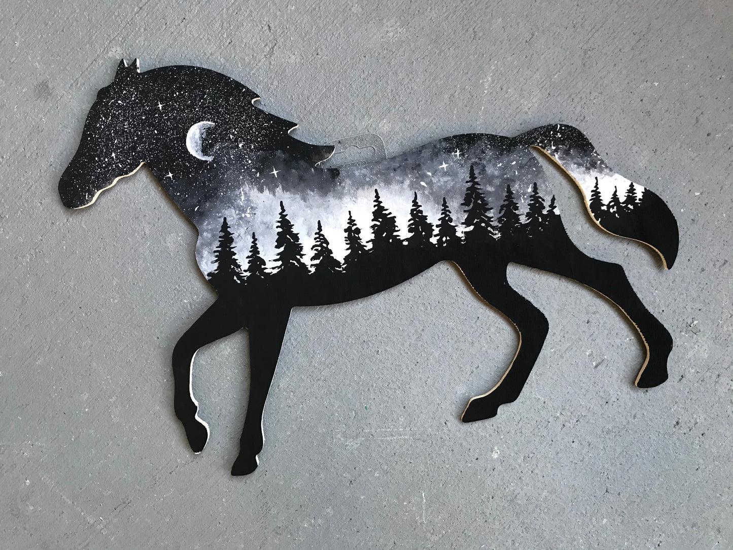 Black and white horse cutout painting