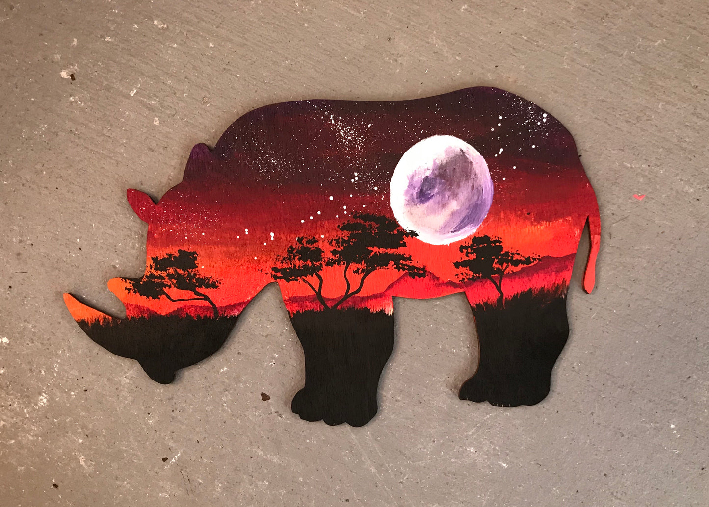Rhinoceros wood cutout painting African animal